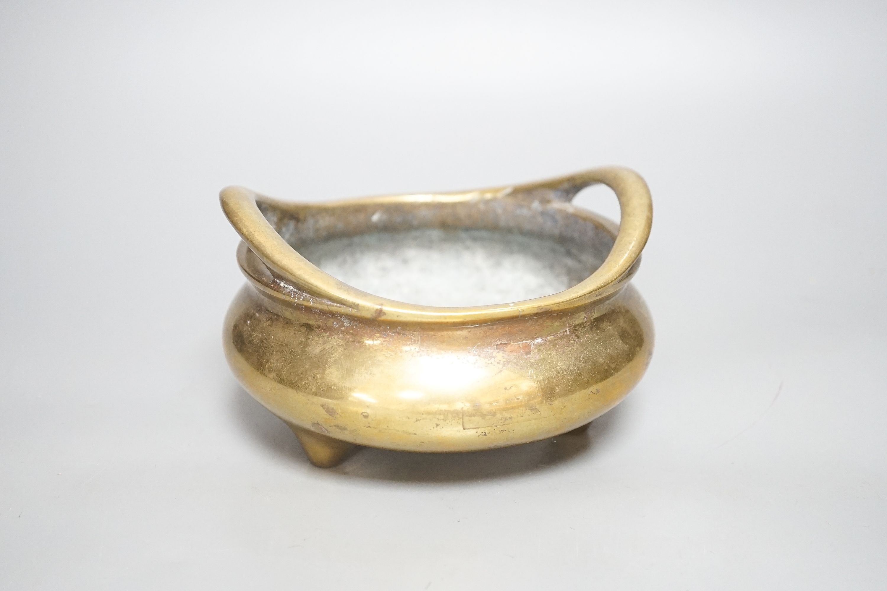 A Chinese bronze ding censer, Xuande sixteen character mark but 19th century, diameter 15cm